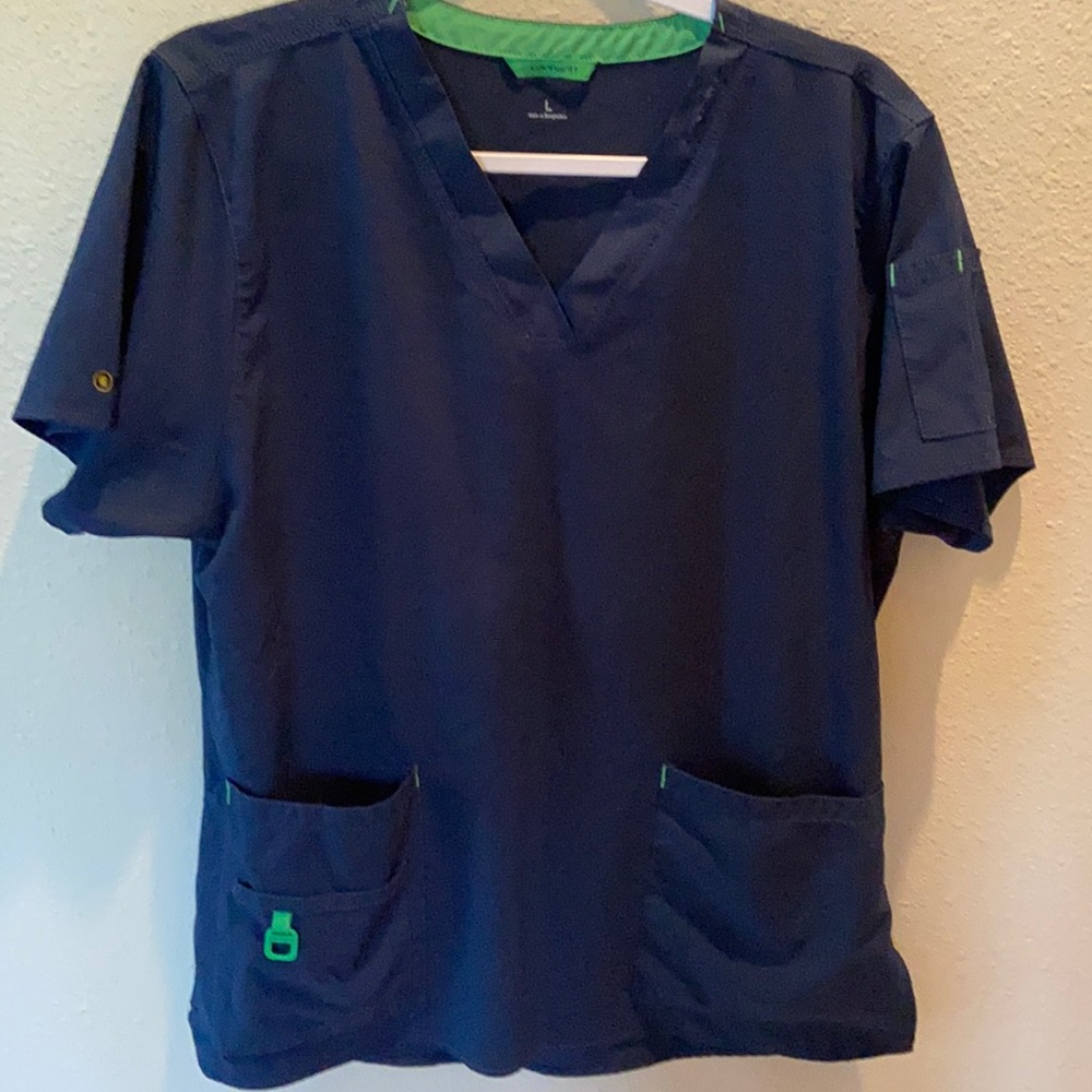 (2) Carhartt EUC scrub tops.